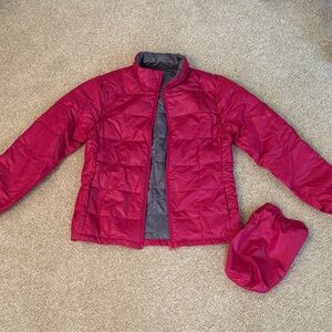 Lightweight magenta colored down filled jacket with Pouch size xs